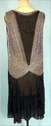 http://www.antiquedress.com/images/2552/flapperblckbestsilvdresbkdd.jpg